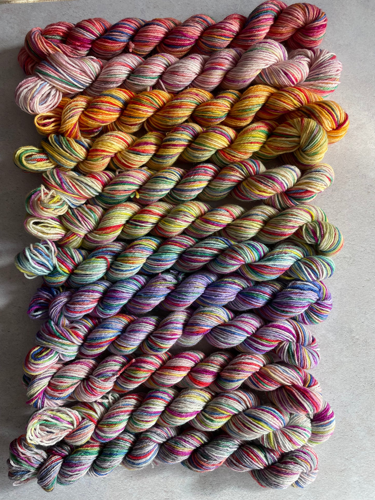 Pastel rainbow sock yarn bundle with 12 mini skeins