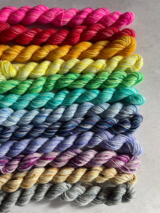 Bright rainbow sock yarn bundle with 12 mini skeins