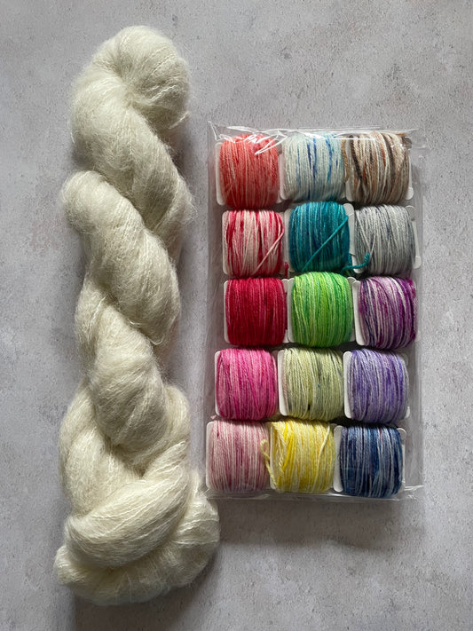 Skein of suri alpaca and silk and 15 5g bobbins of sock yarn