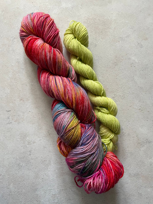 120g sock set with red and multicoloured main skein and lime mini skein