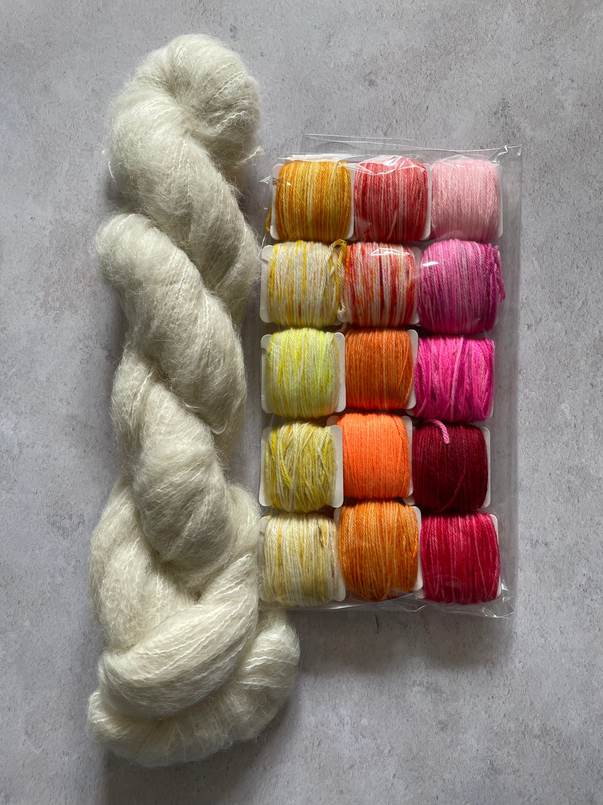 Skein of suri alpaca and silk and 15 5g bobbins of sock yarn
