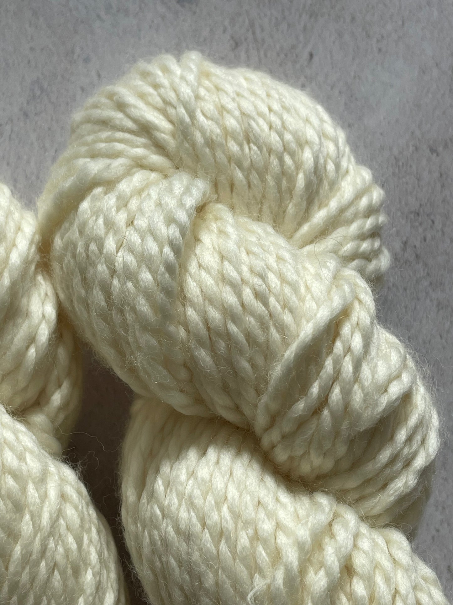 Close up of undyed chunky yarn